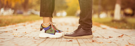 couple feet in the nature at the sunsetの写真素材