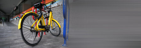 Bicycle parked at the streets backgroundの写真素材