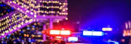 police car in night light street backgroundの写真素材