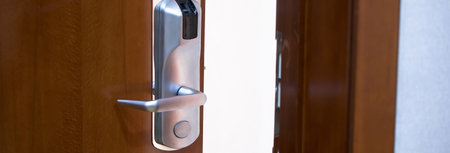 Open modern door to empty light roomの写真素材