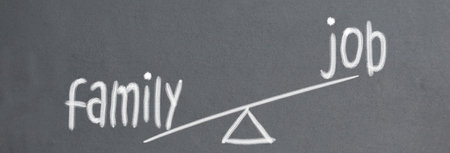 family and job choice on chalkboard backgroundの写真素材