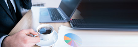 man hand coffee working in office desk backgroundの写真素材