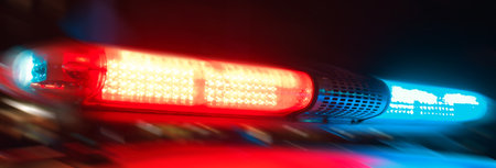 police car in the night light city