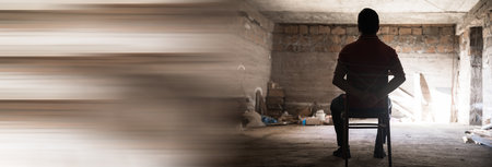 tied with a rope man in chairの写真素材