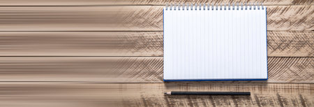 notepad and pencil on the table