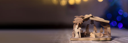 nativity scene on a wooden background