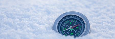compass in the snow in winterの写真素材