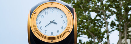 Street clock on city under sky