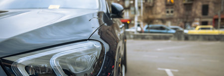 The car parked in asphalt parking lot.の写真素材