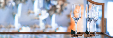 Wedding Mr and Mrs glasses on tableの写真素材