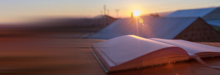 Blank notebook on a wooden tableの写真素材