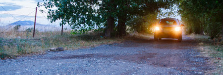 Car driving throung a stony path.の写真素材
