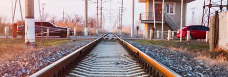 Railway station in motion at sunsetの写真素材