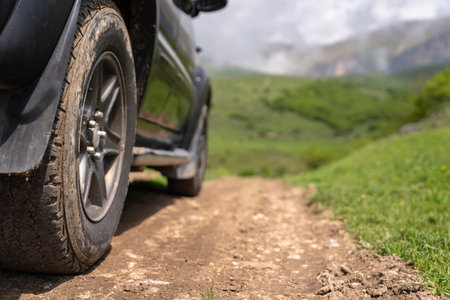 Close-up of the wheels of a mountain climbing all-terrain vehicle, mountain climbing concept