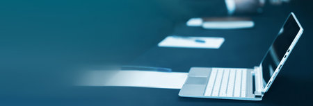 Modern office workplace with laptop computersの写真素材