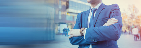 Businessman standing in the street.の写真素材