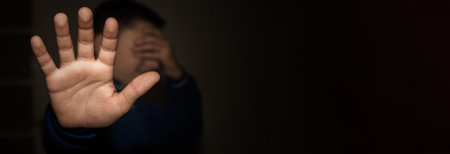 Stressed businessman after business project failure covering eyes in despair and hand gesturing stop...