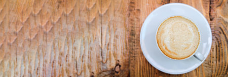 Coffee cup on wooden table