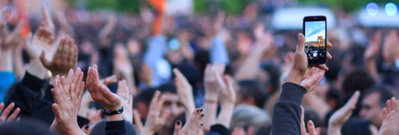 Group of protesting people hands up
