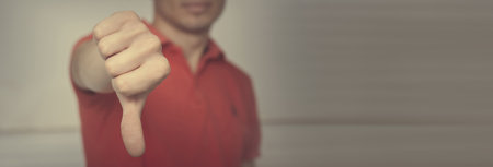Man with his finger down