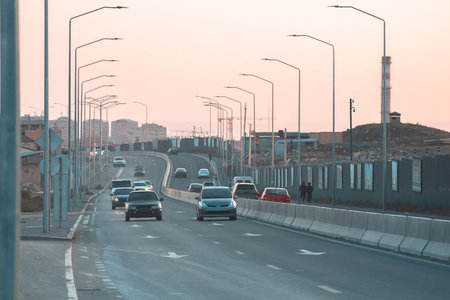 Wide highway, continuous flow of traffic on the road, road traffic, stock photo