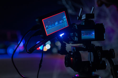 video recording of emergency scene with video camera for news, stock photo