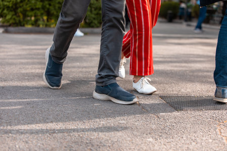 Crossing area, lines, people crossing the road, stock photo