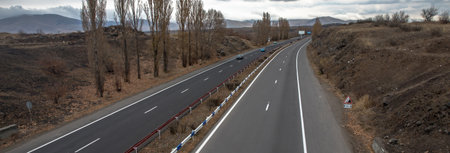 Natural landscape with asphalt road to horizon
