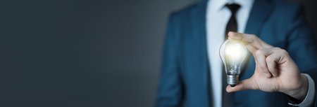 man hand idea or light bulbの写真素材