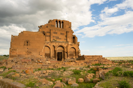 Ancient, half-ruined Armenian church in the landscapeの写真素材