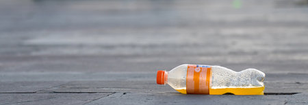 Discarded garbage on the street in the cityの写真素材