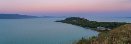 Peninsula and Lake Sevan in the eveningの写真素材