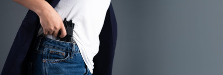 Woman with a firearm in her pants