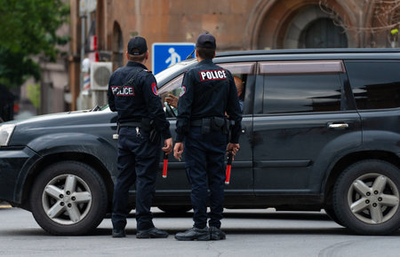 Police officers checking the car, official work process