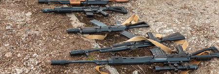 Soviet machine guns lie on the floor on the field