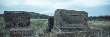 Old cemetery with huge tombstones in armeniaの写真素材