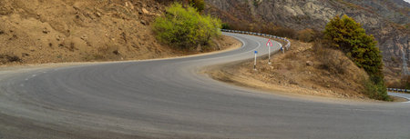 the mountain winding asphalt roadの写真素材