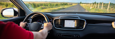 The driver follows the directions of the navigator, photo from inside the car, stock photoの写真素材