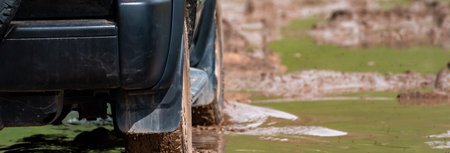 All-terrain vehicle on a rocky, impassable mountain roadの写真素材