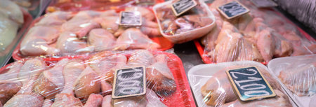 Frozen meat for sale in a supermarketの写真素材