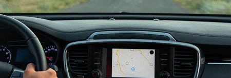 The driver follows the directions of the navigator, photo from inside the car, stock photoの写真素材