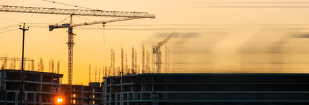 Construction process of high-rise buildings in the cityの写真素材