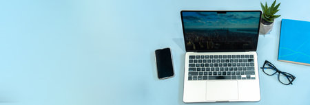 Office table, laptop, glasses on the table, business concept, stock photoの写真素材