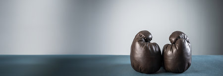 boxing gloves, studio settings, sports concept stock photo, blue, gray backgroundの写真素材