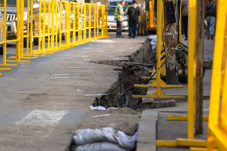 Signs and fences on the street due to road constructionの写真素材