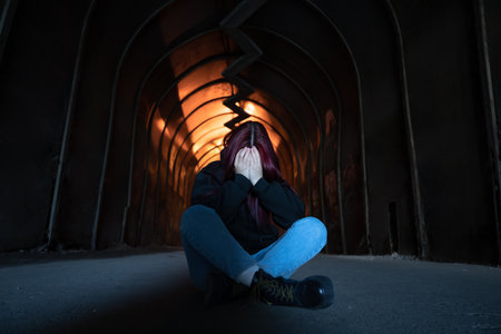 The broken girl in the tunnelの写真素材