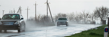 Traffic in rainy weather, wet asphalt