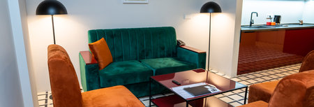 Hotel reception, sofas and armchairs in the waiting roomの写真素材
