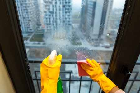 A Housewife Cleaning the Window: A Symbol of Freshness and Cleanliness