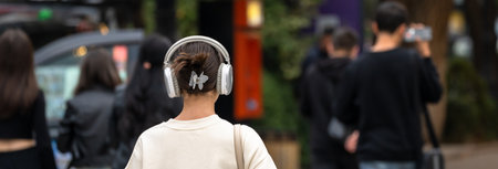 Pedestrians stroll through the cityの写真素材